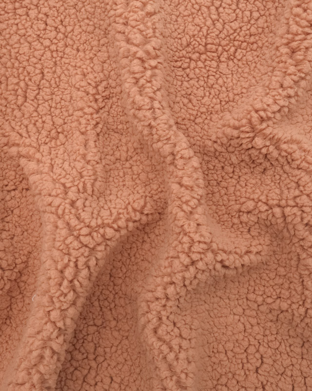 Sherpa-stof in de kleur marsala